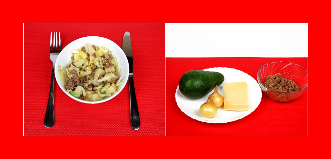 Köstlicher Salat mit Thunfisch, Avocado, Käse und Zwiebeln